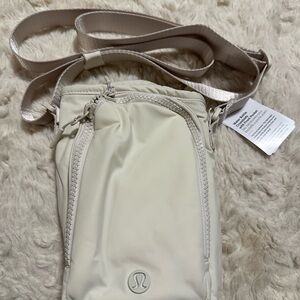 lululemon athletica Cream Crossbody water bottle holder with Adjustable Strap
